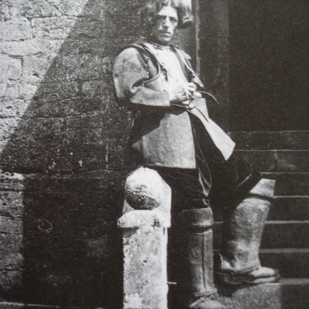 Charles Paget Wade on the steps of his Snowshill Manor in Gloucestershire