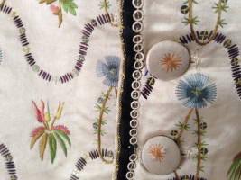 1800s embroidered cream silk with spangles, 'Wearing the Garden' exhibition at Berrington Hall until Jjune 30th. Snowshill Costume Collection.
